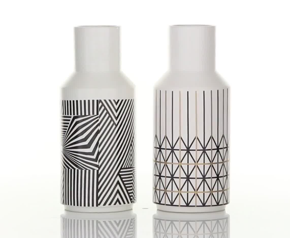 thumbnail video image 2 of CosmoLiving by Cosmopolitan 5"W, 12"H Geometric White Ceramic Vase, Set of 2, 2 of 11