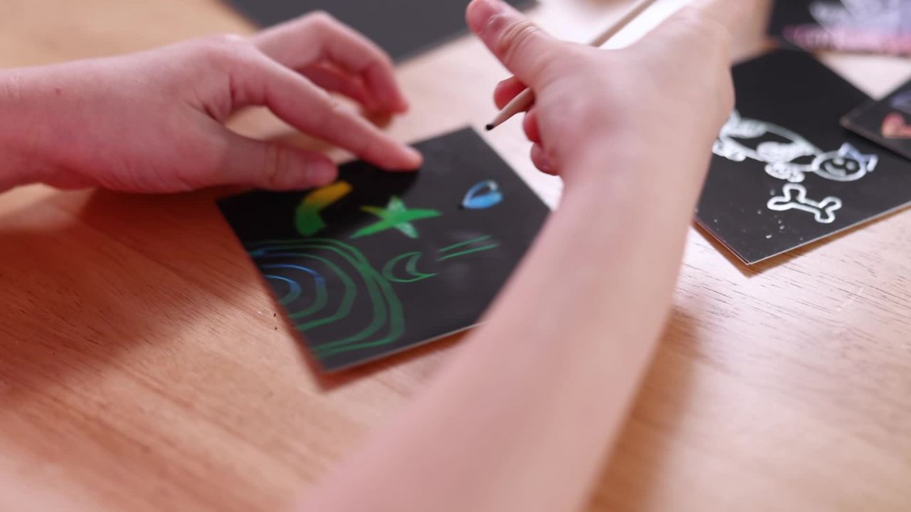 thumbnail video image 2 of Melissa and Doug Scratch Art Rainbow Mini Notes (125) with Wooden Stylus FSC Certified, 1 count, Child, 3.750 L x 3.750 W x 1.750 H inch, 2 of 10