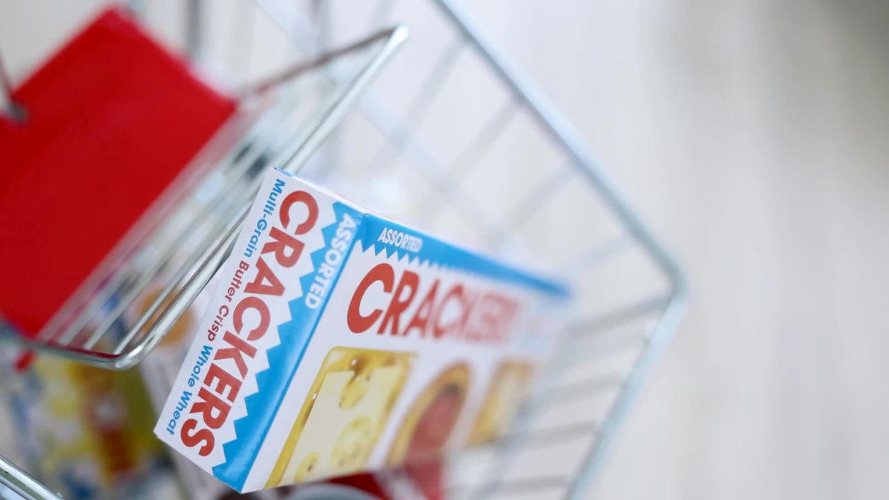 thumbnail video image 2 of Melissa & Doug Toy Shopping Cart with Sturdy Metal Frame, 2 of 10