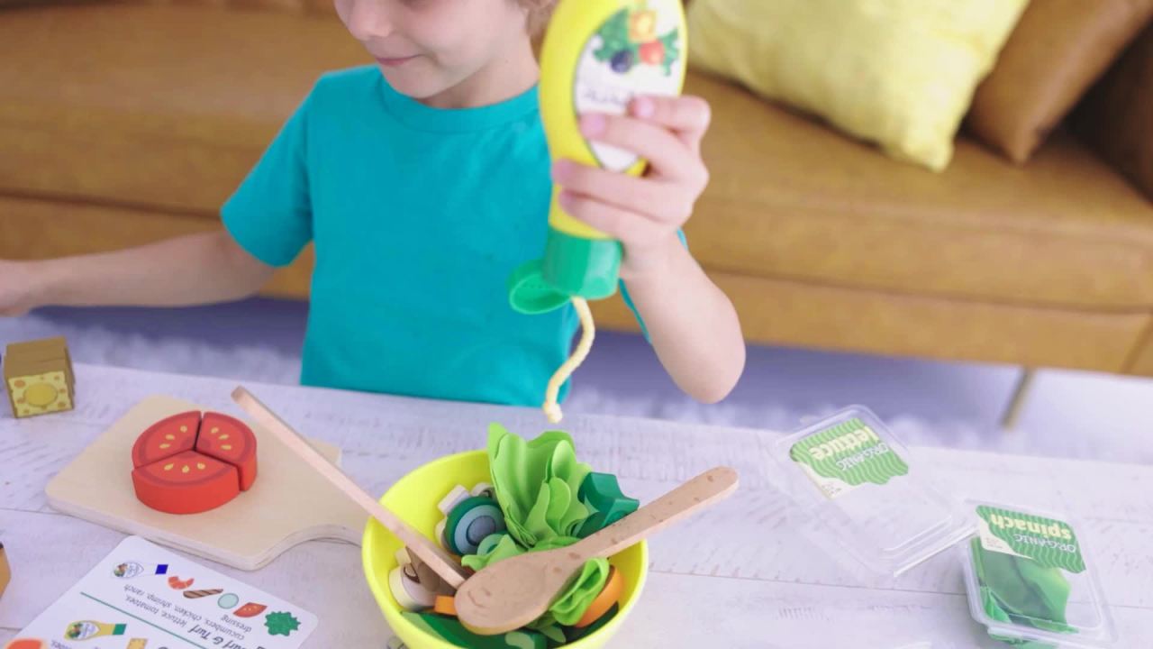 thumbnail video image 2 of Melissa & Doug Slice and Toss Salad Play Food Set – 52 Wooden and Felt Pieces , Green, 2 of 9