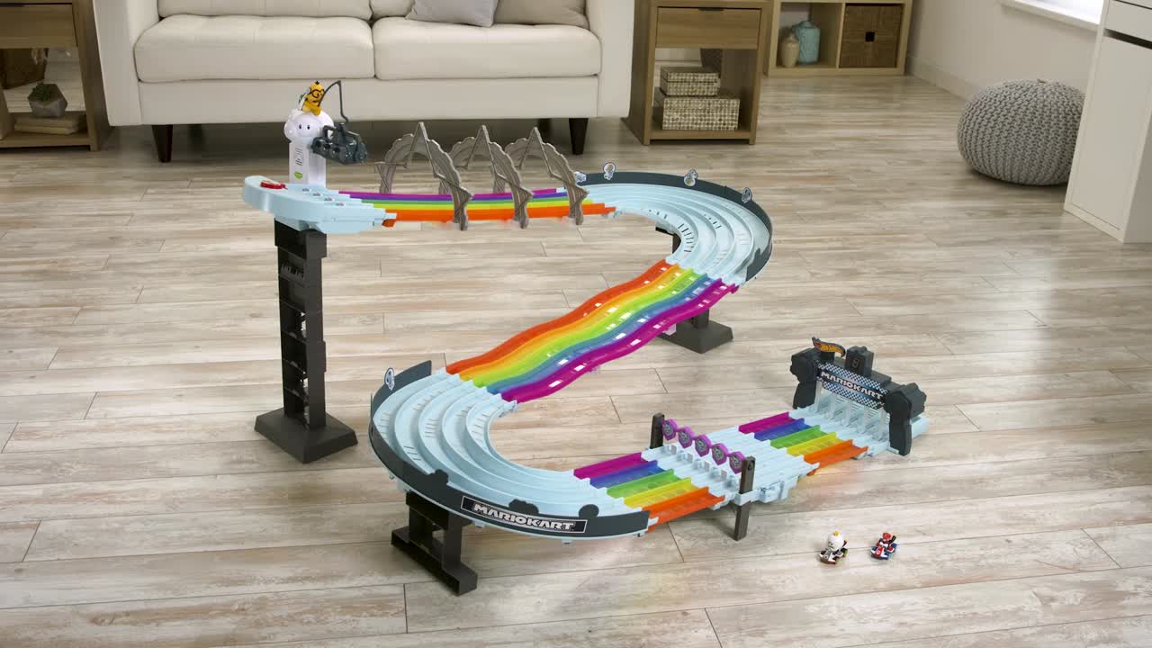 thumbnail video image 2 of Hot Wheels Mario Kart Rainbow Road Raceway Set with Two 1:64 Scale Vehicles, 2 of 7