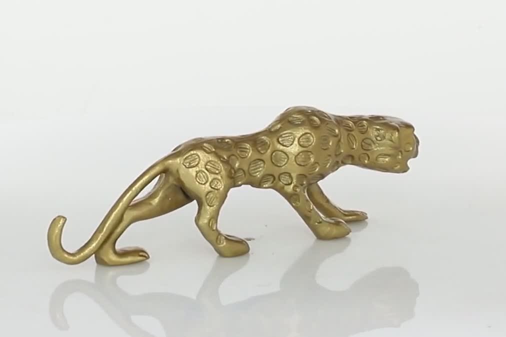 thumbnail video image 2 of DecMode 3"W, 5"H Aluminum Contemporary Leopard Sculpture, Gold, 2 of 15