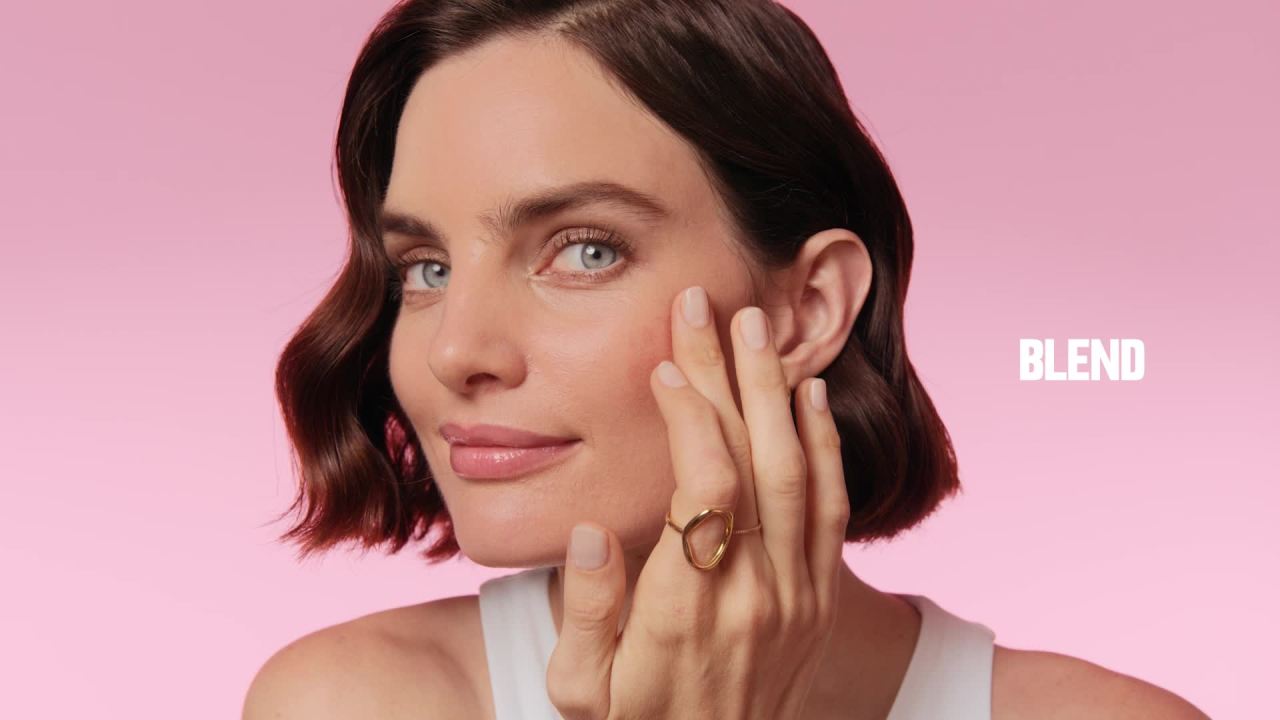 thumbnail video image 3 of Revlon Glimmer Blush Drops, Liquid Cheek Blush, 101 Coralicious, 0.32 fl oz, 3 of 14