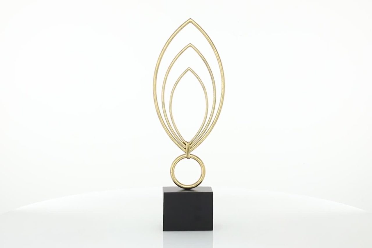 thumbnail video image 2 of 8" x 24" Gold Metal Abstract Sculpture with Black Base, by CosmoLiving by Cosmopolitan, 2 of 9