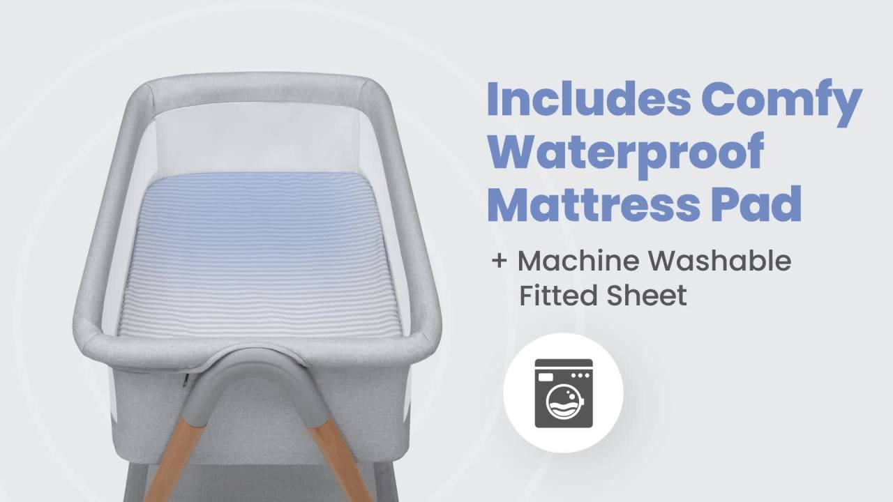 thumbnail video image 2 of Delta Children Haven Beechwood by the Bed Bassinet with Breathable Mesh and  Natural Beechwood Legs, Grey Stripe, 2 of 8