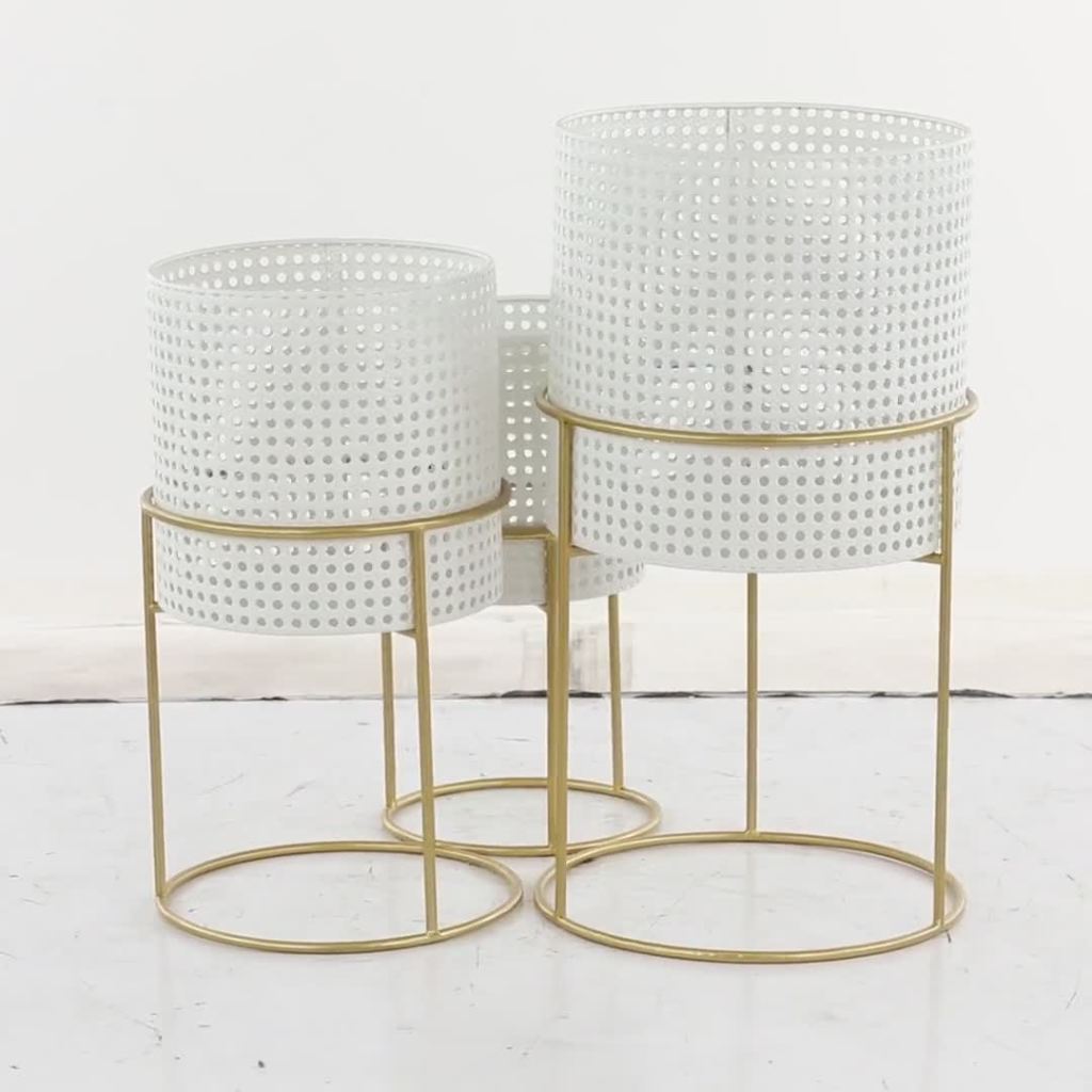 thumbnail video image 2 of DecMode 23", 19", 16"H Rattan Weave Inspired White Metal Planter with Removeable Ring Stands (3 Count), 2 of 16