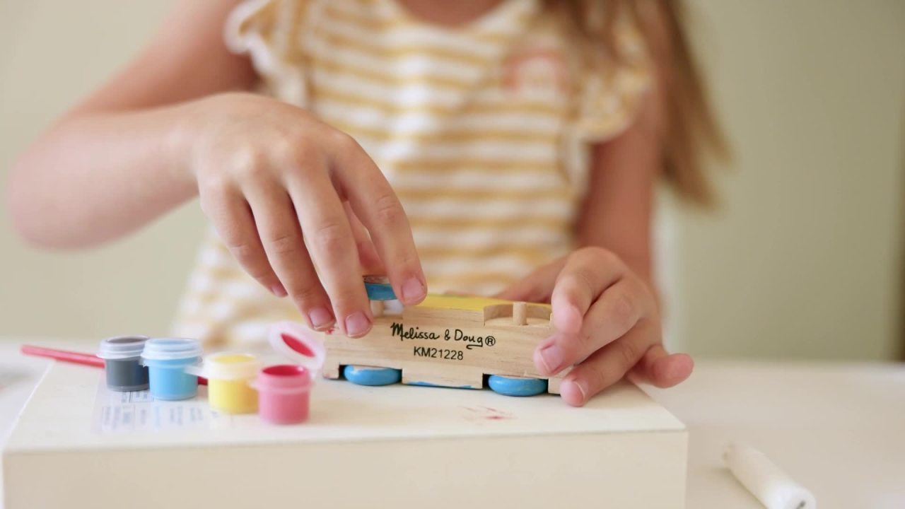 thumbnail video image 2 of Melissa & Doug Decorate-Your-Own Wooden Race Car Craft Kit, 2 of 3