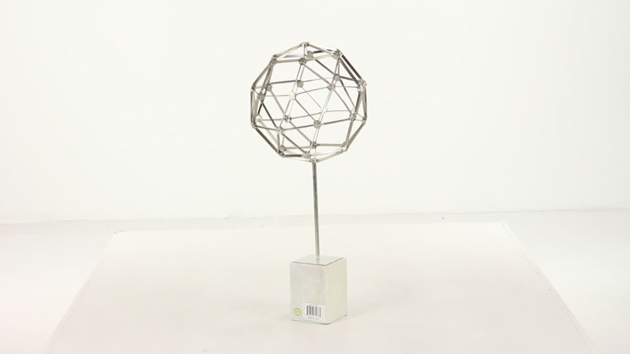 thumbnail video image 2 of DecMode Modern 25 inch silver iron nucleus sphere sculpture with white marble base, 2 of 5