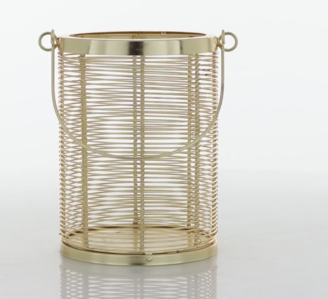 thumbnail video image 2 of DecMode Gold Metal Pillar Candle Lantern with Thin Metal Handle, 2 of 10