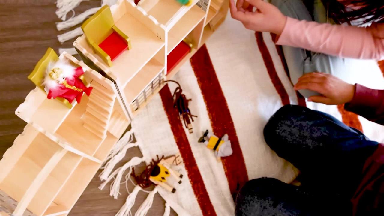thumbnail video image 2 of Melissa & Doug Fold and Go Wooden Castle Dollhouse With  Wooden Dolls and Horses (12 pcs), 2 of 10