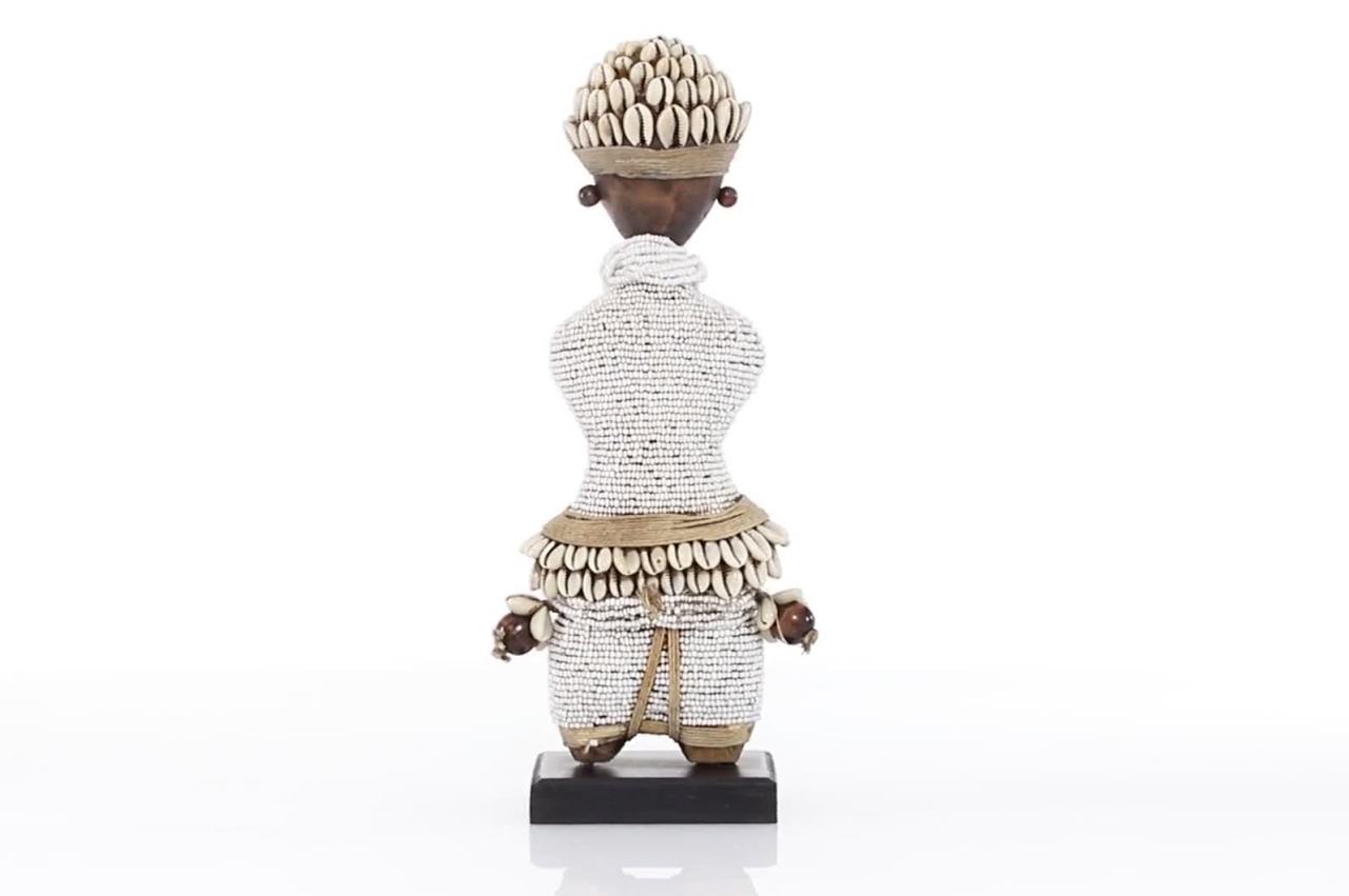 thumbnail video image 2 of DecMode Small Hand-Crafted Pine Wood, Cowrie Shells, Orange Beads & Kente Cloth African Woman Namji Doll, White, 2 of 10