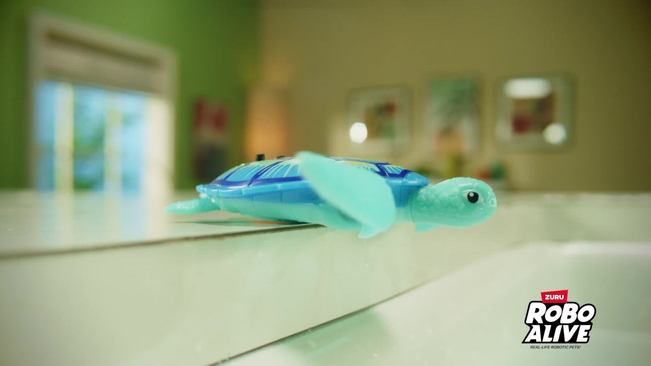 thumbnail video image 2 of Robo Alive Turtles Electronic Robot Toy (2 Pack), Water Activated Toy for Child by ZURU, 2 of 11