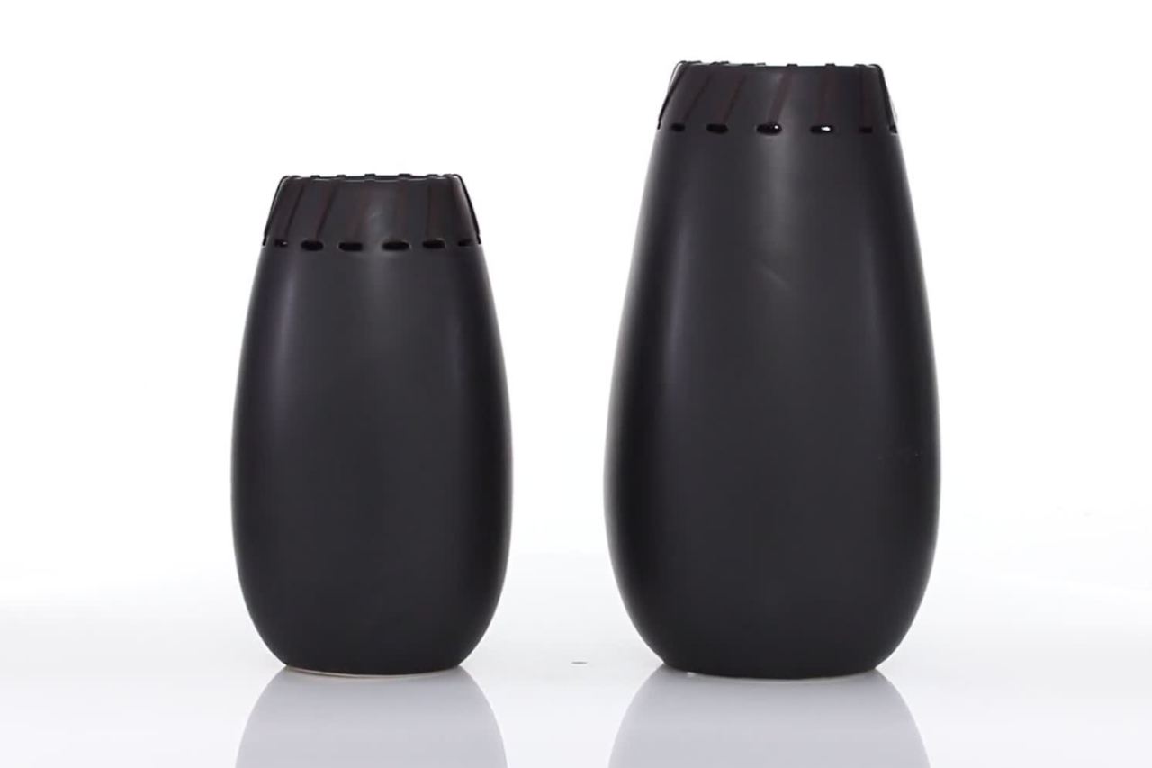 thumbnail video image 2 of DecMode 16", 13"H Black Ceramic Vase with Cut Out Patterns, Set of 2, 2 of 9