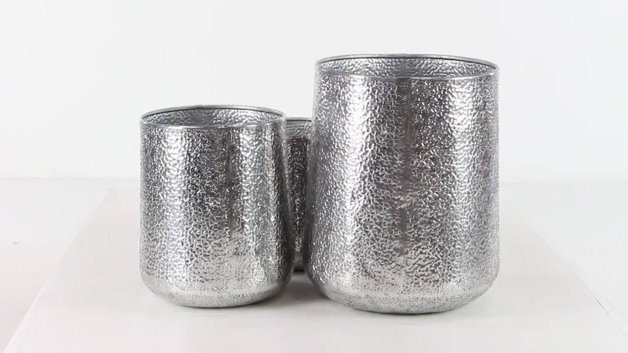 thumbnail video image 2 of DecMode 12", 16", 20"H Silver Aluminum Metal Planter with Hammered Design (3 Count), 2 of 14