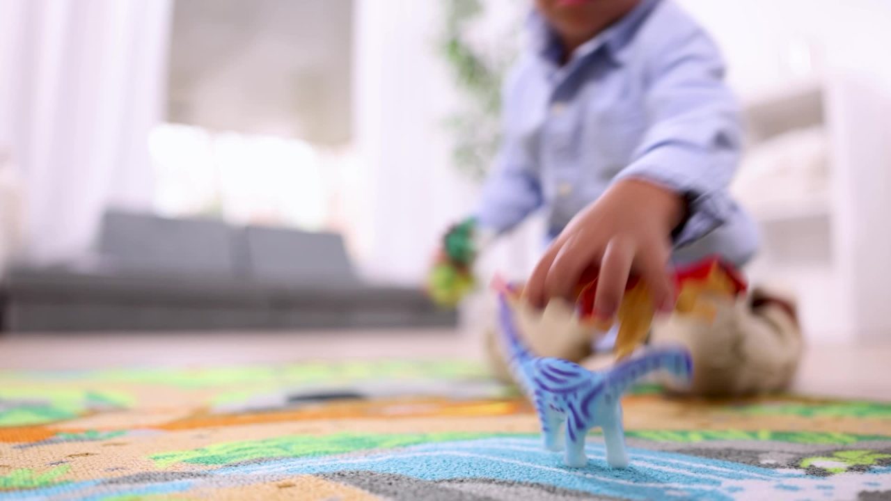 thumbnail video image 2 of Melissa & Doug Prehistoric Playground Dinosaur Activity Rug (39 x 36 inches) - 4 Toy Animals, 2 of 10
