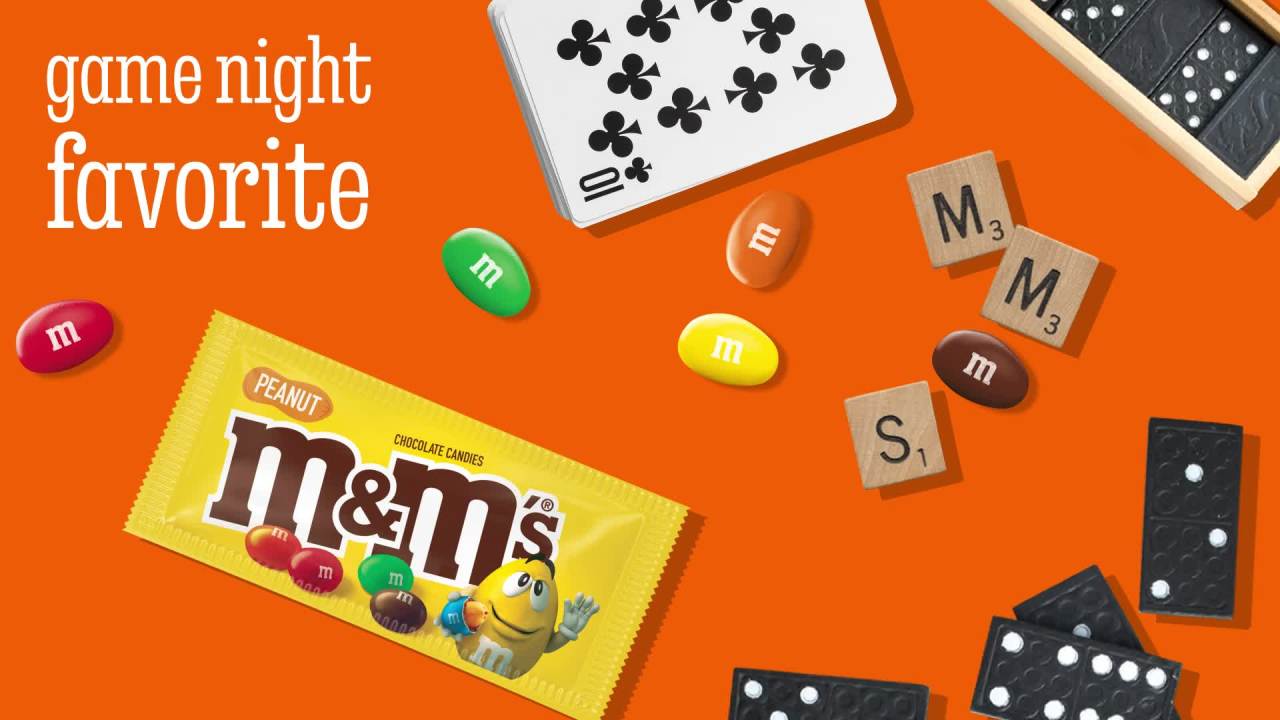 thumbnail video image 2 of M&M's Peanut Milk Chocolate Candy, Full Size - 1.74 oz Pouch, 2 of 15