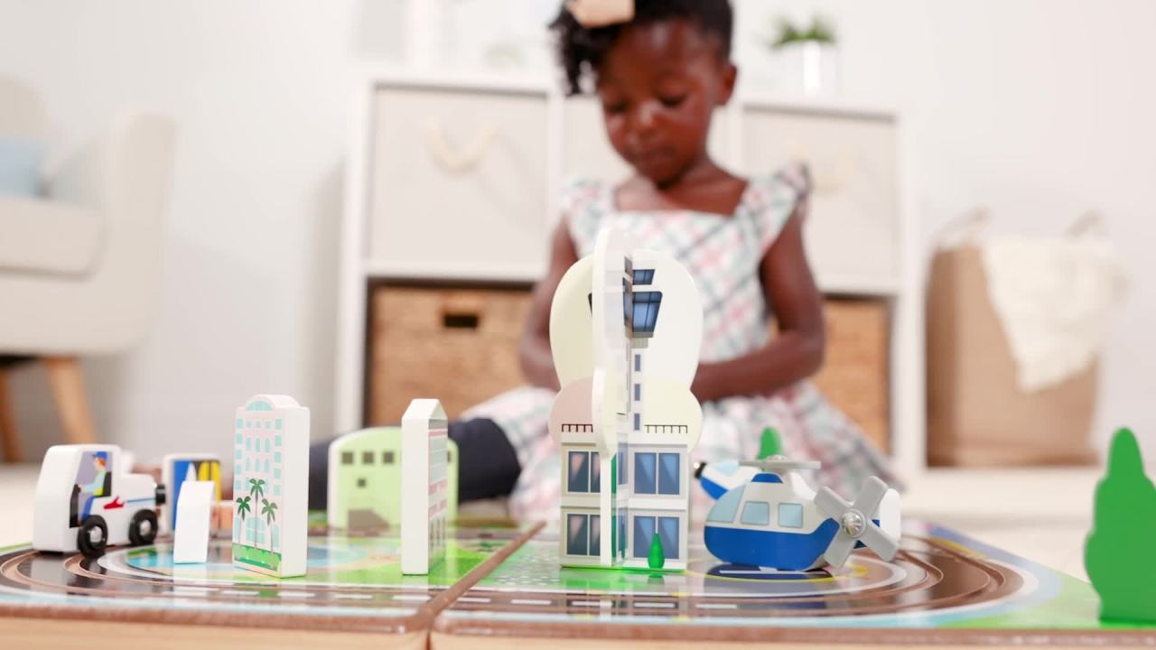 thumbnail video image 2 of Melissa & Doug Take-Along Airport Play Set, Vehicles, Built-in Tracks, Model Train Set, for Toddlers 3+, 2 of 10