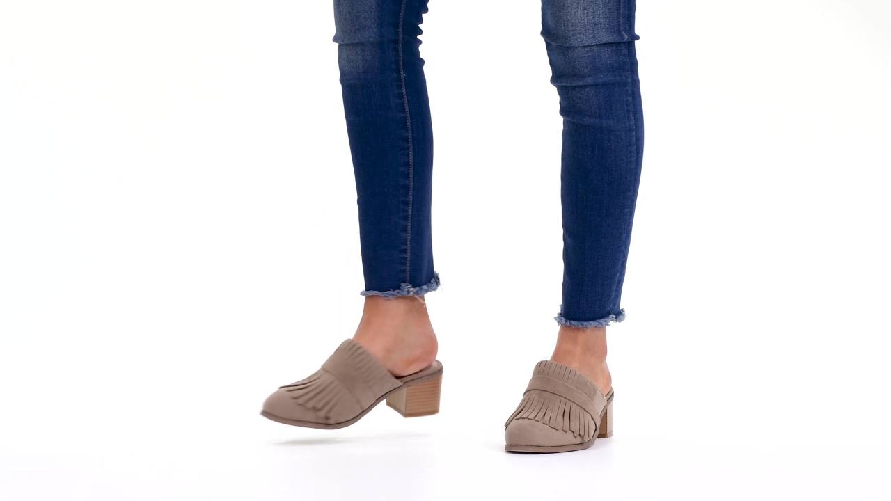 thumbnail video image 2 of Brinley Co. Womens Stacked Heel Faux Suede Fringe Mules, 2 of 8