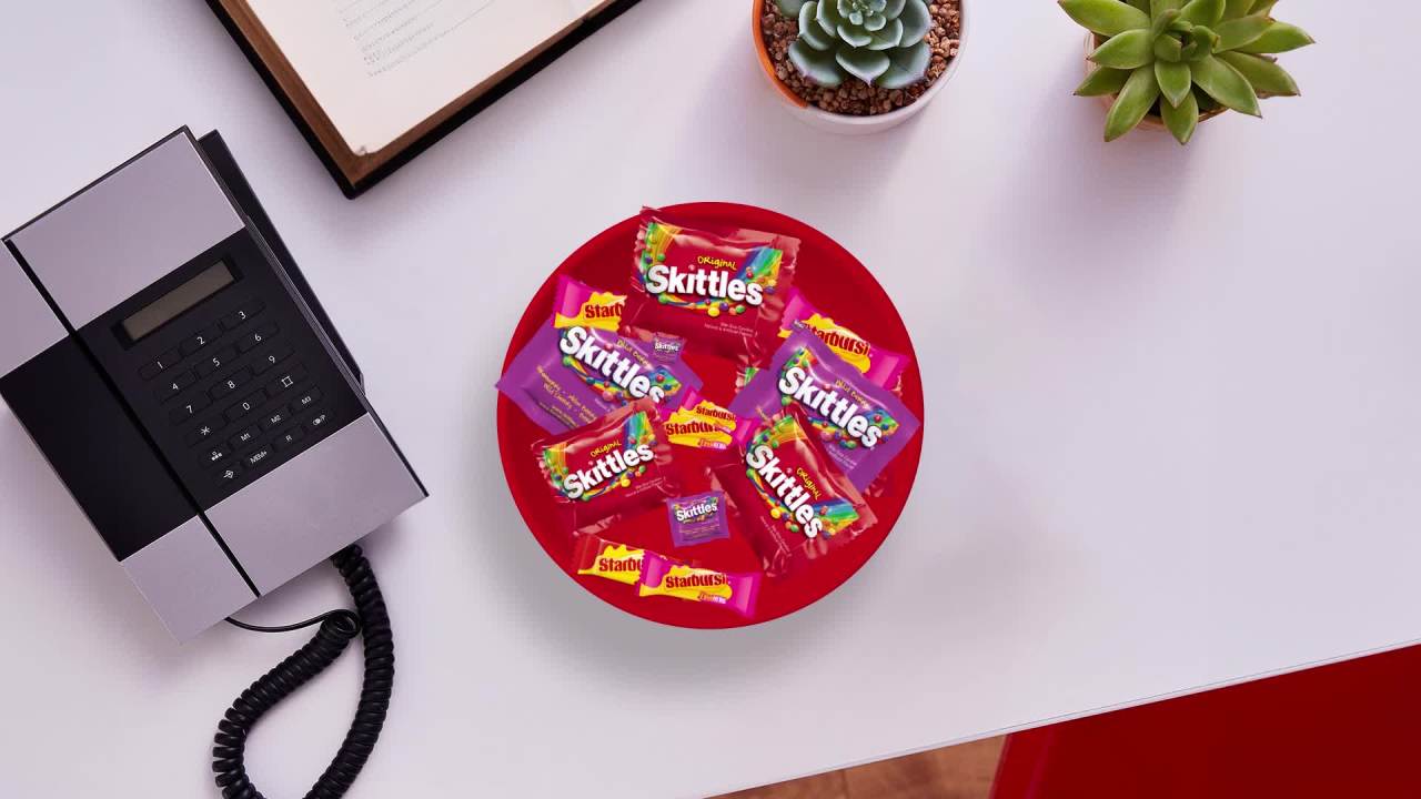 thumbnail video image 2 of Skittles & Starburst Fun Size Chewy Candy Variety Bag , Family Size - 14.24 oz Bulk Bag, 2 of 13