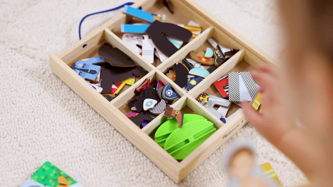 thumbnail video image 2 of Melissa & Doug Occupations Magnetic Dress-Up Wooden Dolls Pretend Play Set (82 pcs), 2 of 10