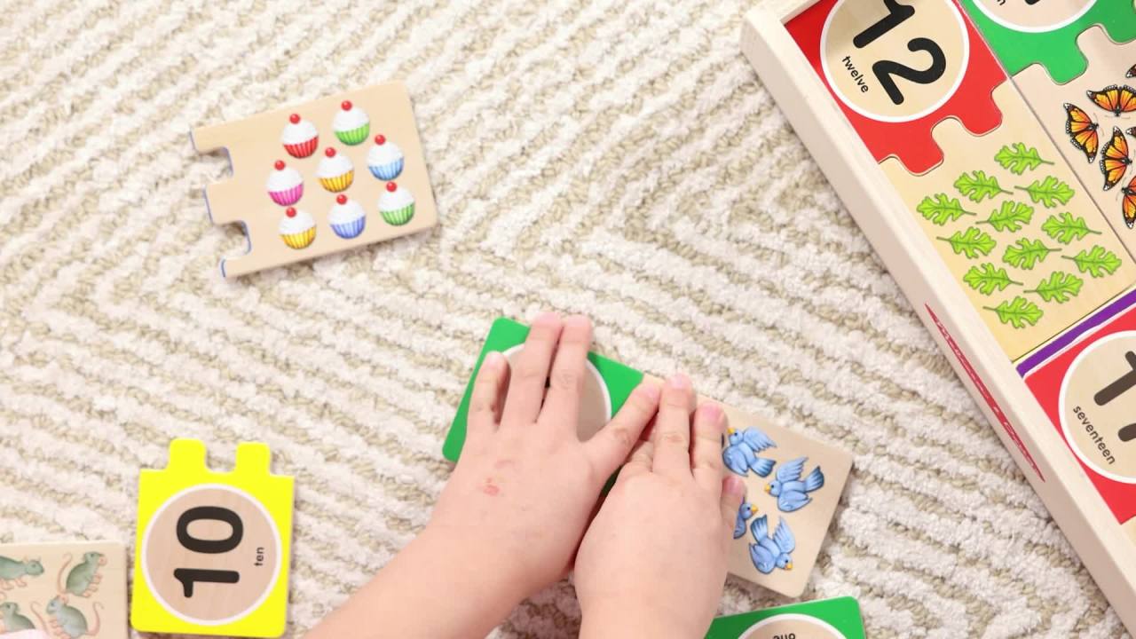 thumbnail video image 2 of Melissa & Doug Self-Correcting Wooden Number Puzzles with Storage Box (40 Pcs), 2 of 10
