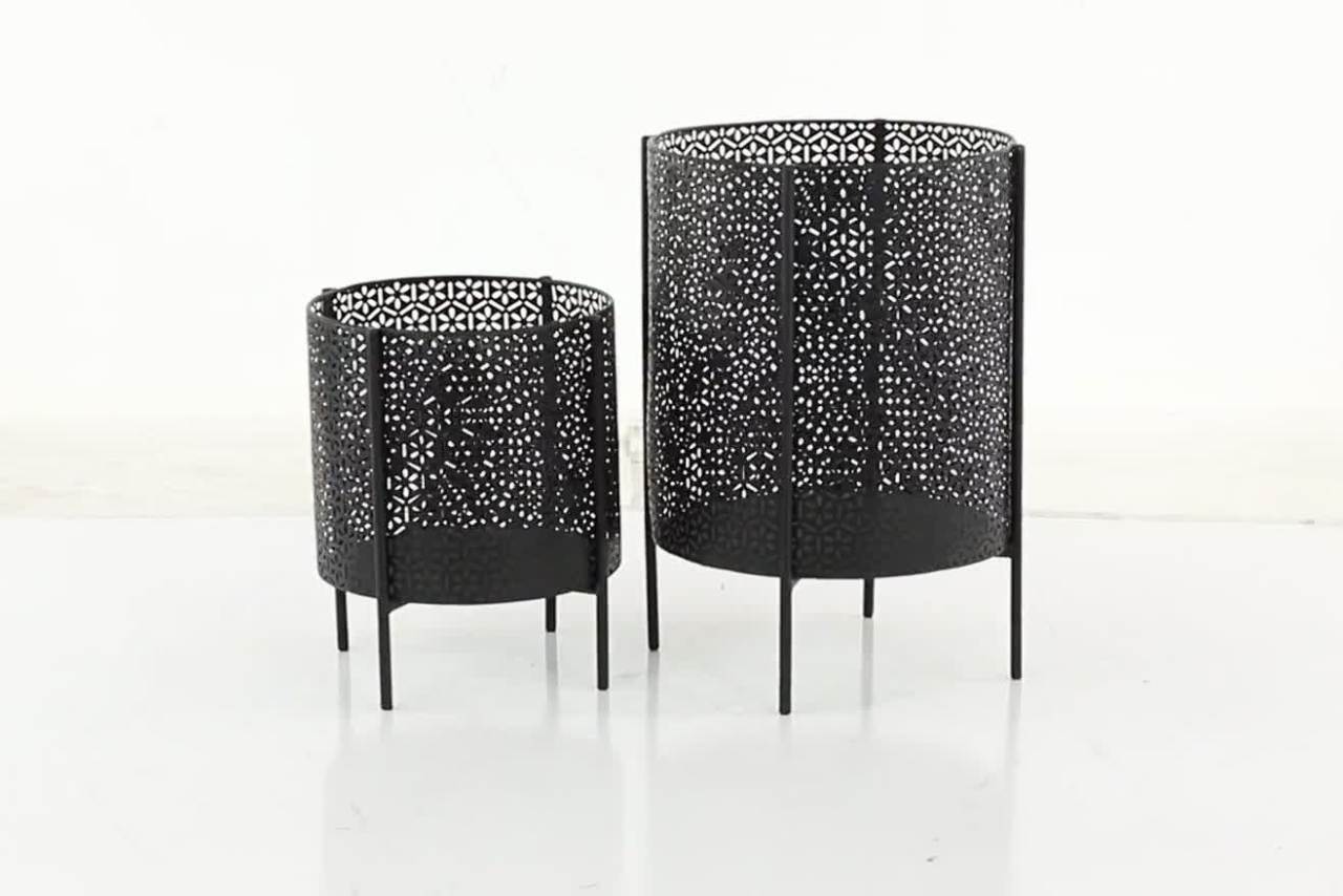 thumbnail video image 2 of CosmoLiving by Cosmopolitan 18", 12"H Cutout Black Metal Floral Planter with Removable Stand (2 Count), 2 of 9