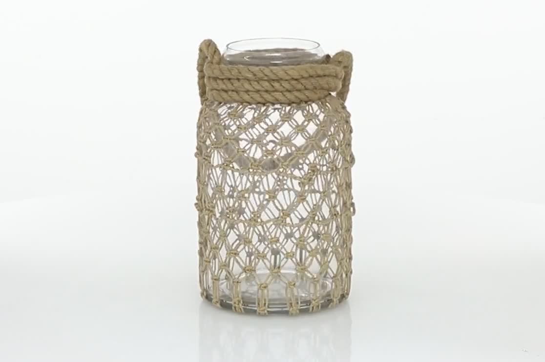 thumbnail video image 2 of DecMode Clear Glass Decorative Candle Lantern with Rope Handle, 2 of 10