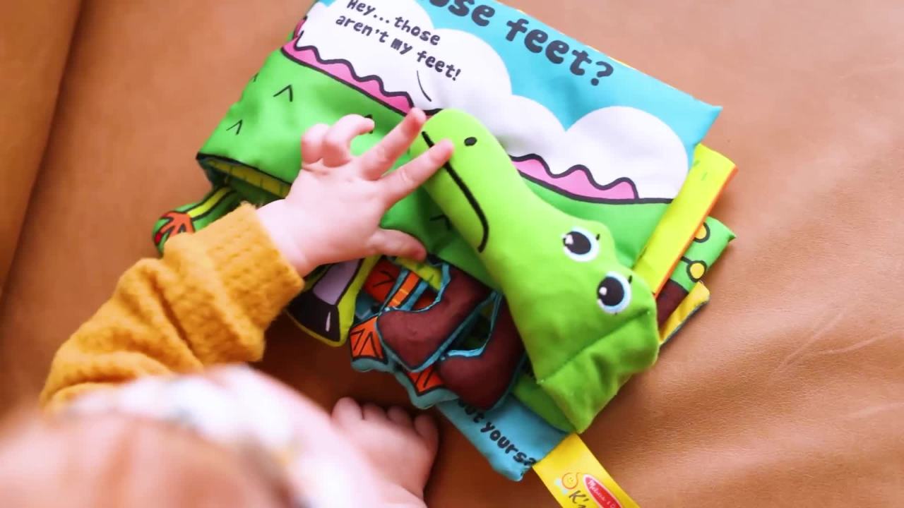 thumbnail video image 2 of Melissa & Doug Soft Activity Baby Book - Whose Feet?, 2 of 10