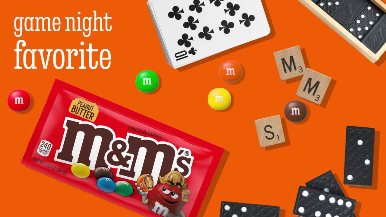 thumbnail video image 2 of M&M's Peanut Butter Milk Chocolate Candy, Full Size - 1.63 oz Bag, 2 of 13