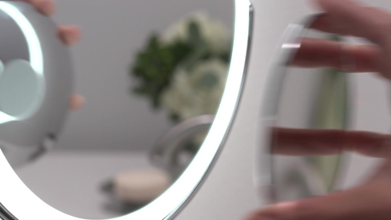 thumbnail video image 2 of Sharper Image® SpaStudio™ Vanity 8-inch Mirror with Built-In Qi Wireless Phone Charger, 5X and 10X Magnification, 2 of 13