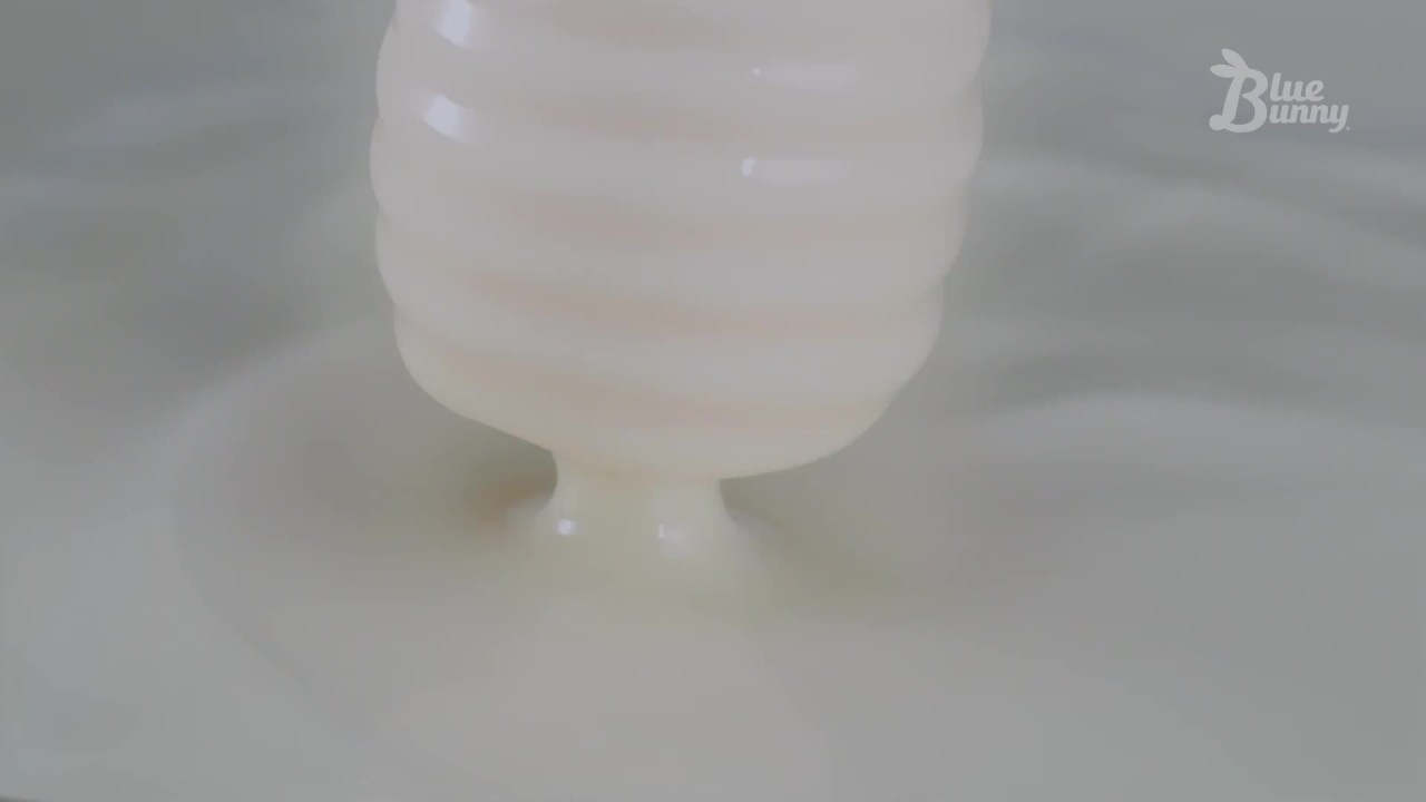 thumbnail video image 2 of Blue Bunny Mini Swirls Strawberry Shortcake Cone, Whipped Cream Flavored Coating with Cake Pieces, Iced Frozen Dessert, 2.3 fl oz, 8 Pack, 2 of 14