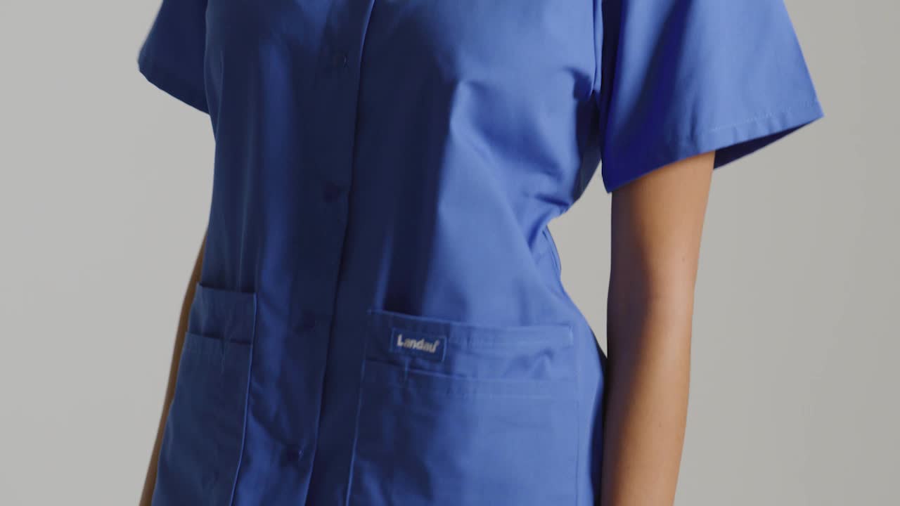thumbnail video image 2 of Landau Snap V-Neck Scrub Top (Women), 2 of 10