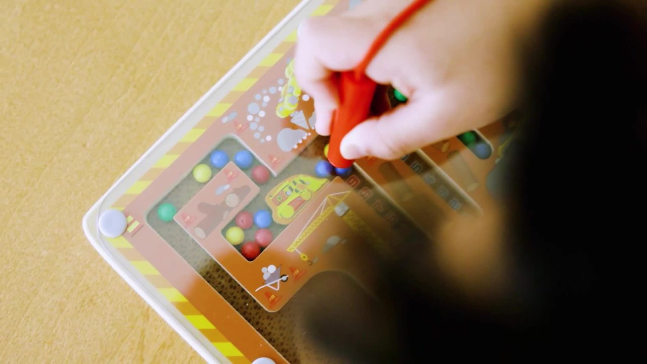 thumbnail video image 2 of Melissa & Doug PAW Patrol Wooden 4-in-1 Magnetic Wand Maze Board - FSC Certified, 2 of 10