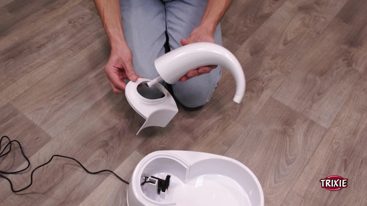 thumbnail video image 2 of TRIXIE Curved Stream 84.5oz Drinking Fountain for Cats and Dogs, Large Pet Water Fountain, 2 of 9