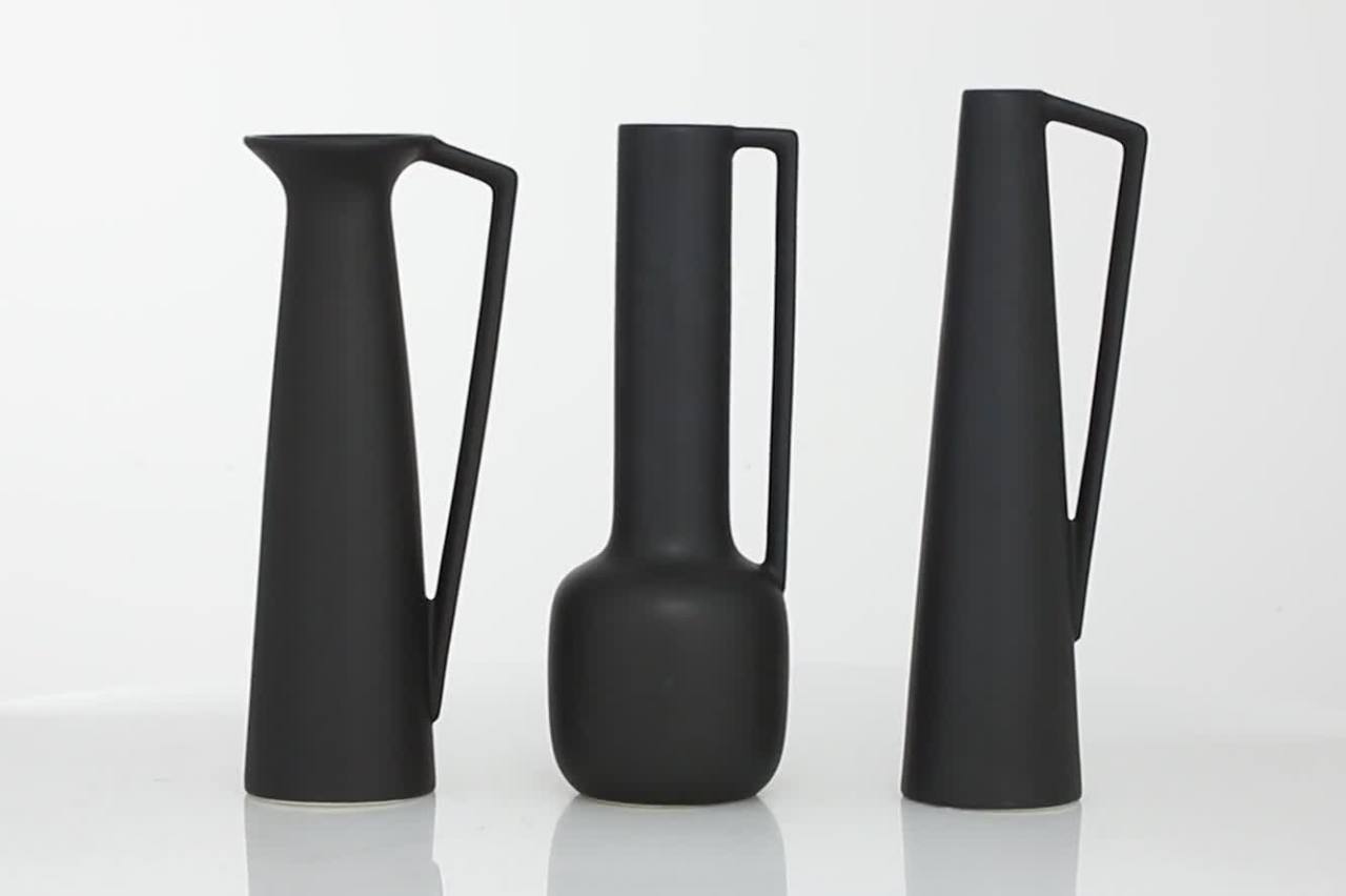 thumbnail video image 2 of CosmoLiving by Cosmopolitan 17", 16", 16"H Black Ceramic Vase with Handles, Set of 3, 2 of 12