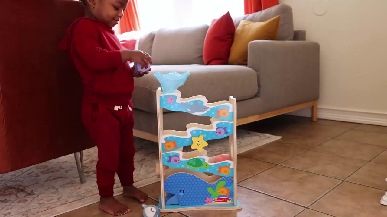 thumbnail video image 2 of Melissa & Doug Rollables Wooden Ocean Slide Infant and Toddler Toy (5 Pieces) - FSC Certified, 2 of 10