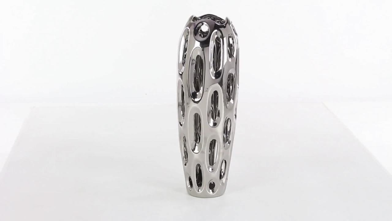 thumbnail video image 2 of DecMode 21" Rounded Cutout Silver Ceramic Vase, 2 of 14