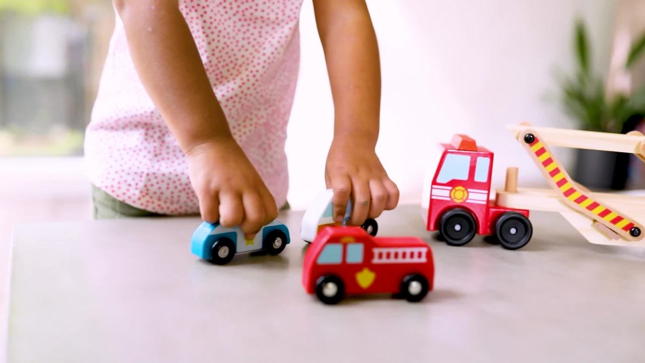 thumbnail video image 3 of Melissa & Doug Wooden Emergency Vehicle Carrier, 3 of 11