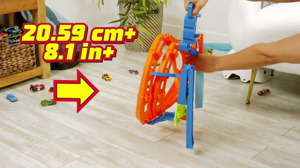 thumbnail video image 3 of Hot Wheels Whip Around Raceway Track Set, Includes 2 Toy Cars in 1:64 Scale, Easy Storage, 3 of 8