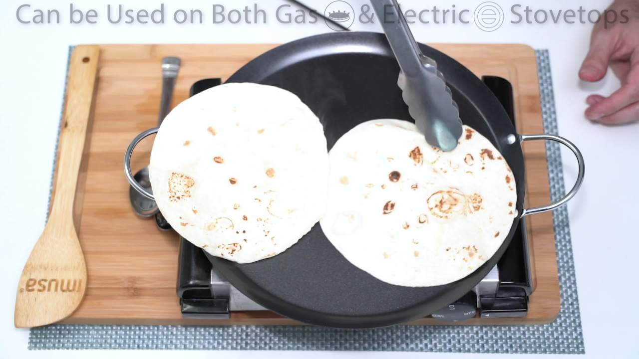 thumbnail video image 2 of IMUSA 9in Carbon Steel Nonstick Round Comal with Metal Handles, Black, 2 of 9