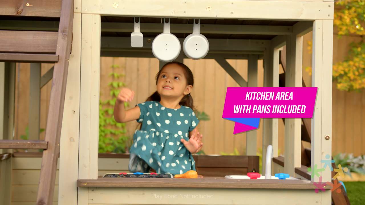 thumbnail video image 2 of KidKraft Cozy Escape Wooden Outdoor Two-Story Playhouse with Slide, Kitchen, Rock Wall and Bench, 2 of 9