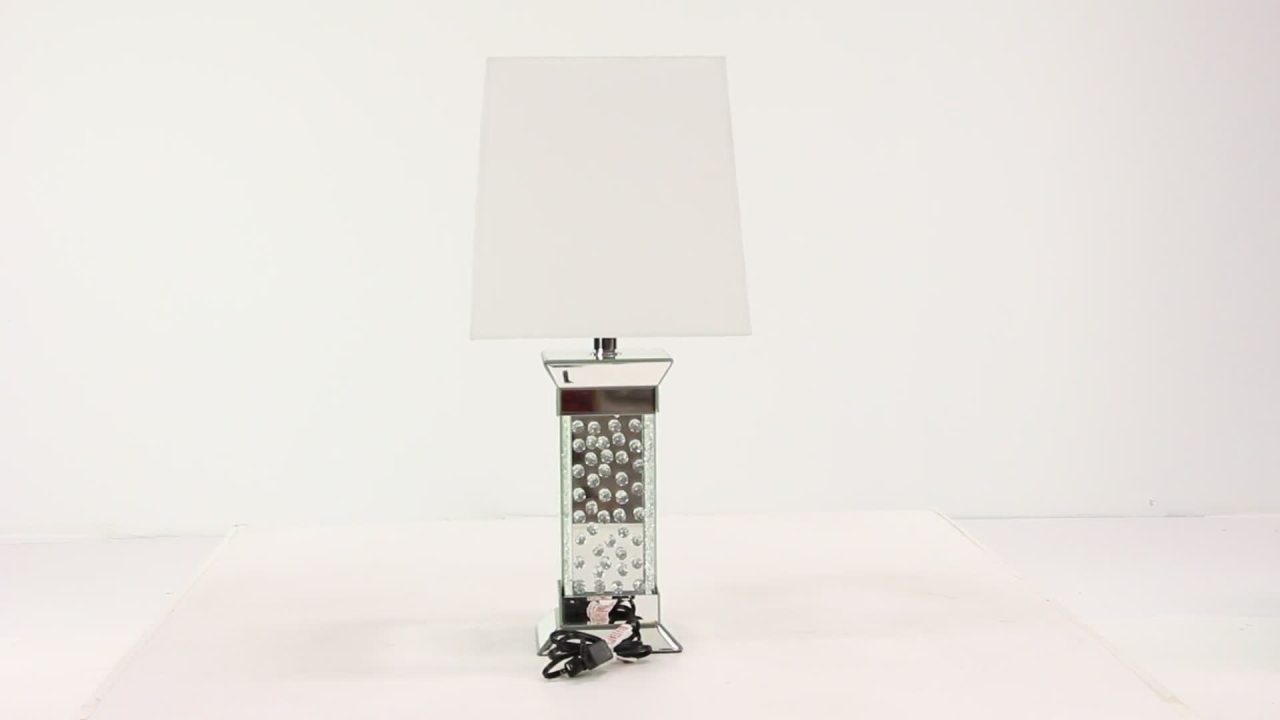 thumbnail video image 2 of DecMode 30" Mirrored Silver Table Lamp with Cream Fabric Shade, 2 of 11