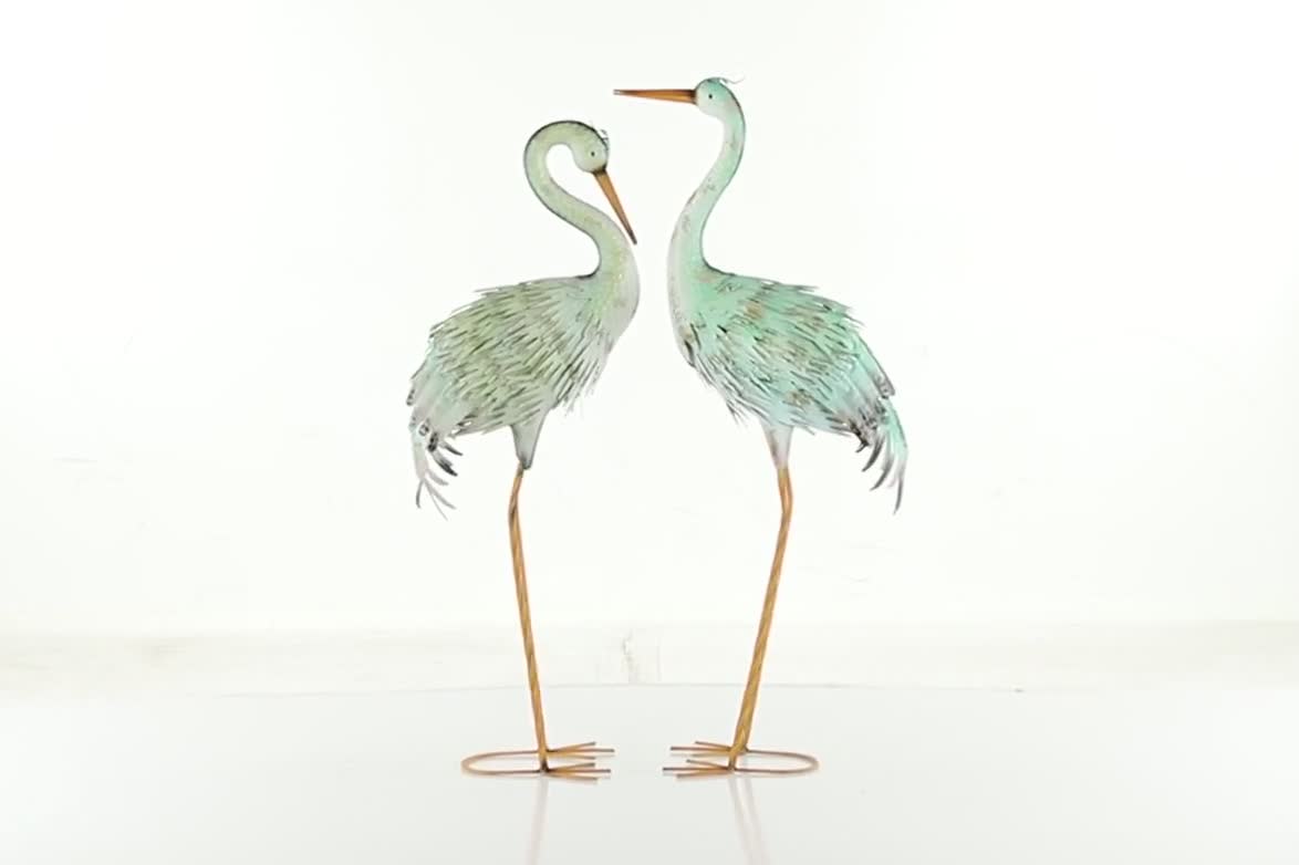 thumbnail video image 2 of DecMode 41" Indoor Outdoor Crane Garden Sculpture with Coiled U Shaped Feet (2 Pack), 2 of 11