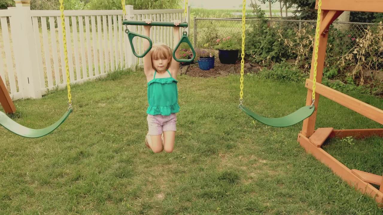 thumbnail video image 5 of Gorilla Playsets Great Skye II Treehouse Wooden Swing Set with 2 Swing Belts, 3 Slides, and Rope Ladder, 5 of 6