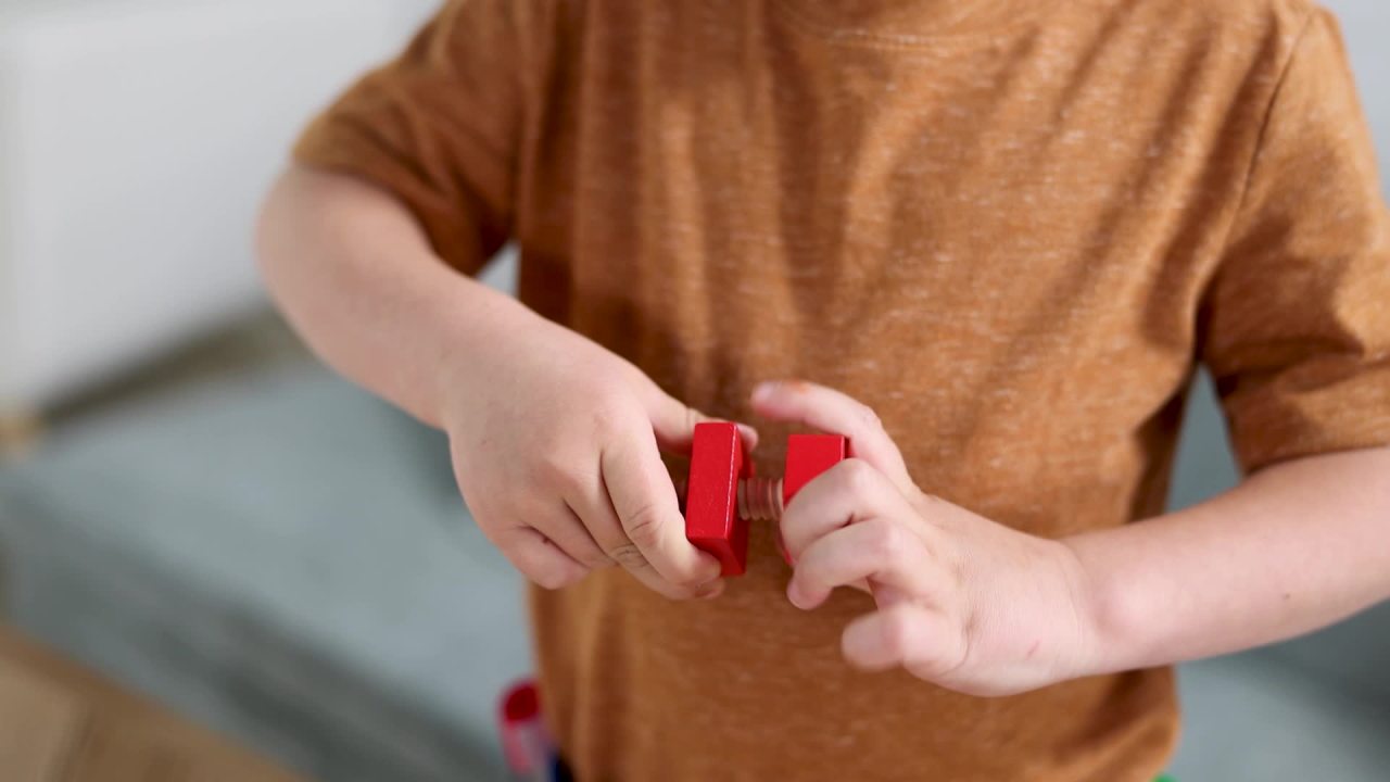 thumbnail video image 2 of Melissa & Doug Deluxe Tool Belt Set - 5 Wooden Tools, 8 Building Pieces, Adjustable Belt, 2 of 10