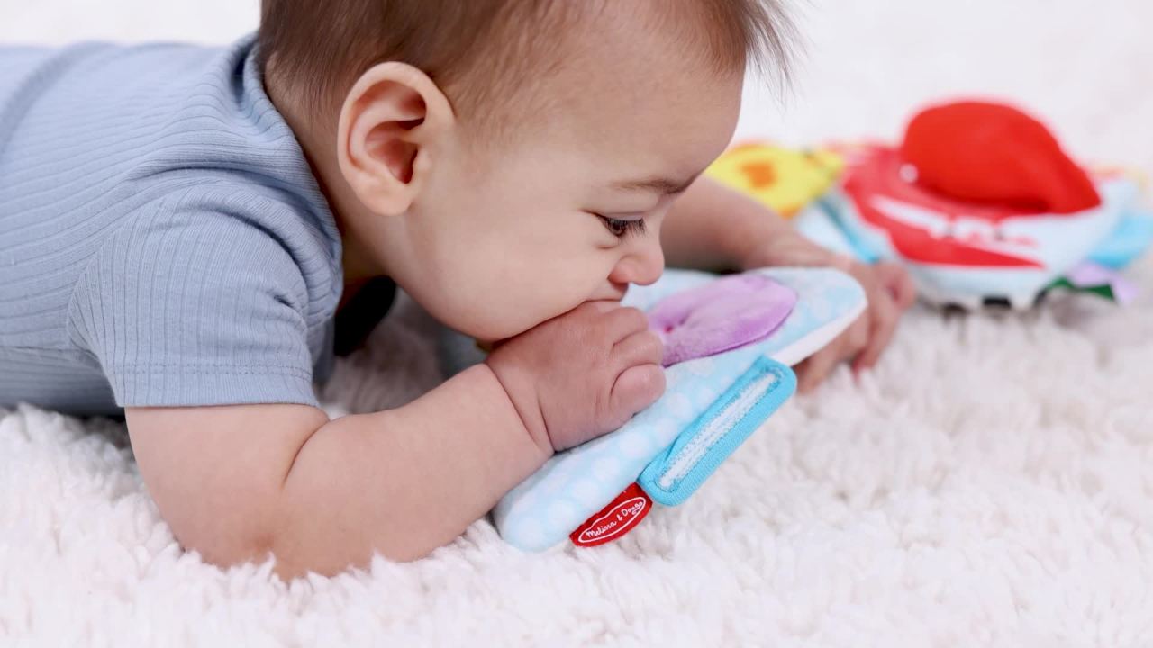 thumbnail video image 2 of Melissa & Doug Ocean Tummy Time Triangle Infant Baby Toy, 2 of 9