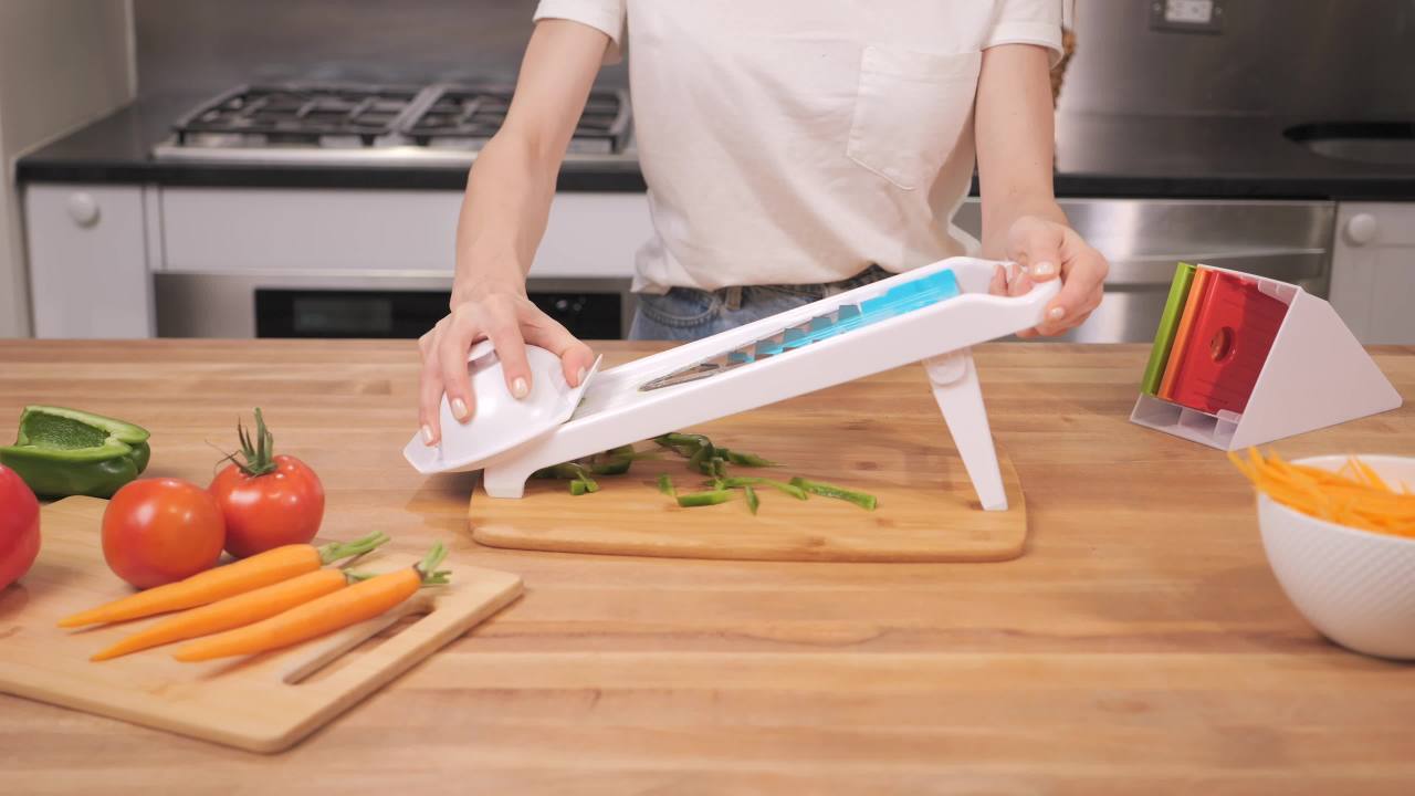 thumbnail video image 2 of Farberware Professional V-Blade Deluxe Foldable Easy Storage Mandolin Slicer Set, 2 of 17