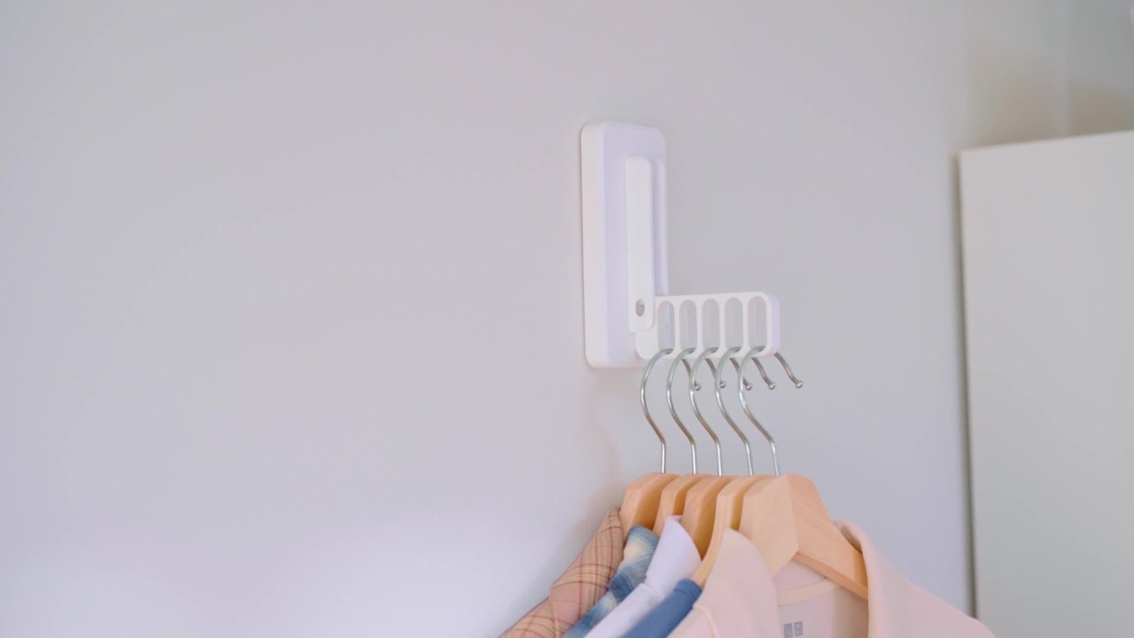 thumbnail video image 2 of Command Folding Clothes Hanger, White, Holds 5 Hangers to 7.5 lbs, 1 Hook, 3 Strips, 2 of 8