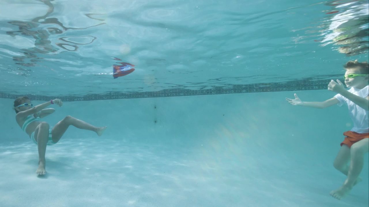 thumbnail video image 2 of Wahu Aqua Rocket Red/Blue Water & Pool Toy - Glides up to 30' Underwater, Child Ages 5+, 2 of 7