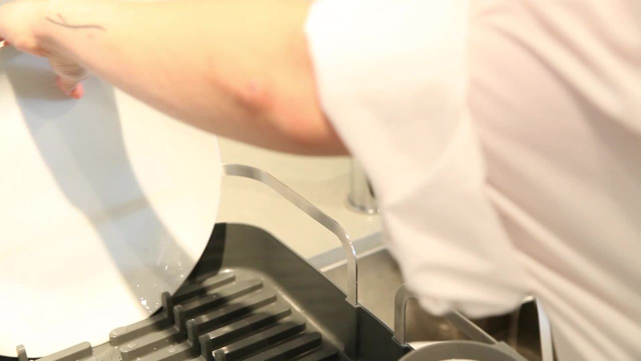 thumbnail video image 2 of Umbra Holster Dish Rack– Molded Plastic Dish Drying Rack With Drainage Spout, Charcoal, 2 of 17